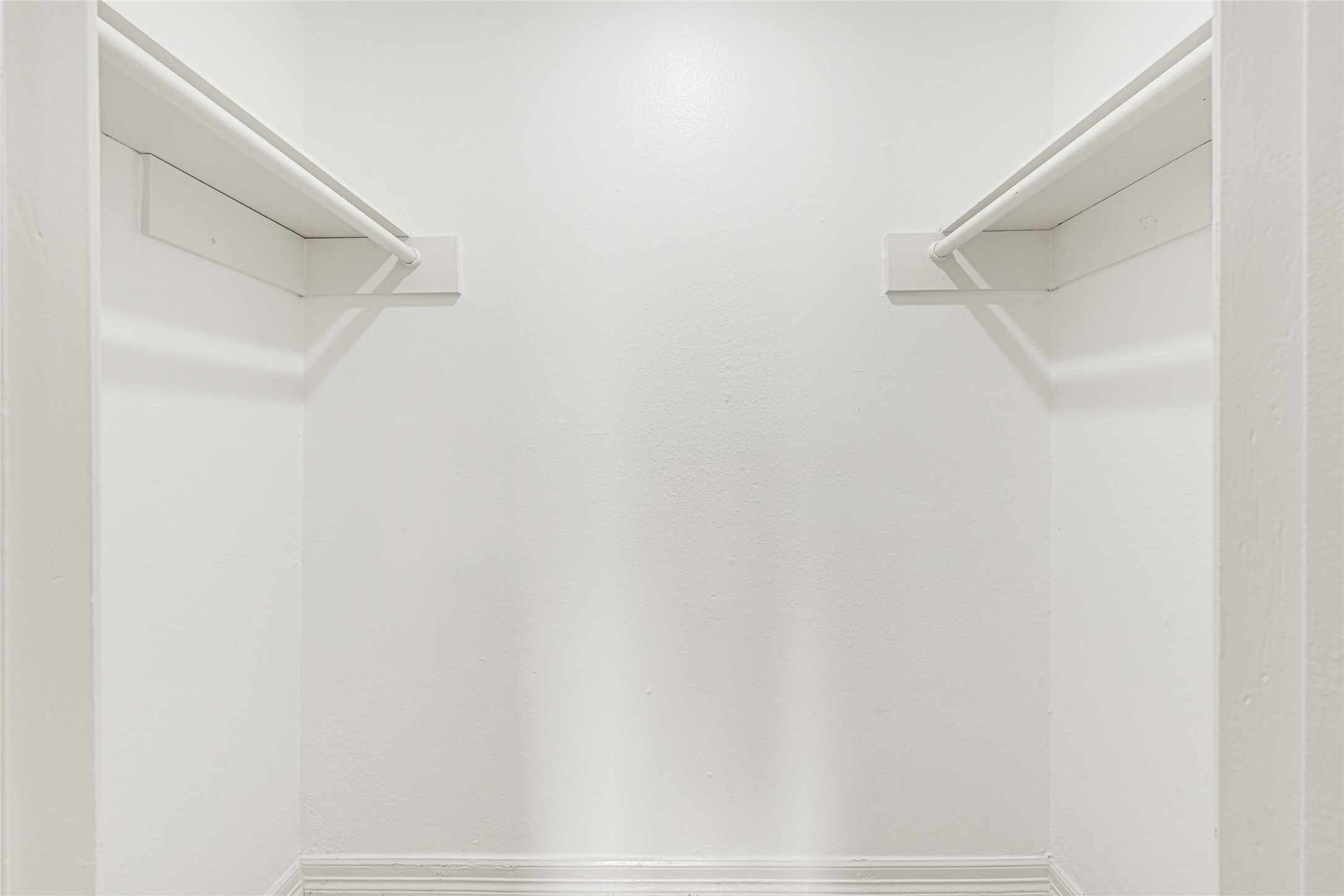 4102 Townes Forest Road Friendswood, TX 77546 - Photo 31 of 50 Large walk-in closet with dual hanging areas for added convenience.