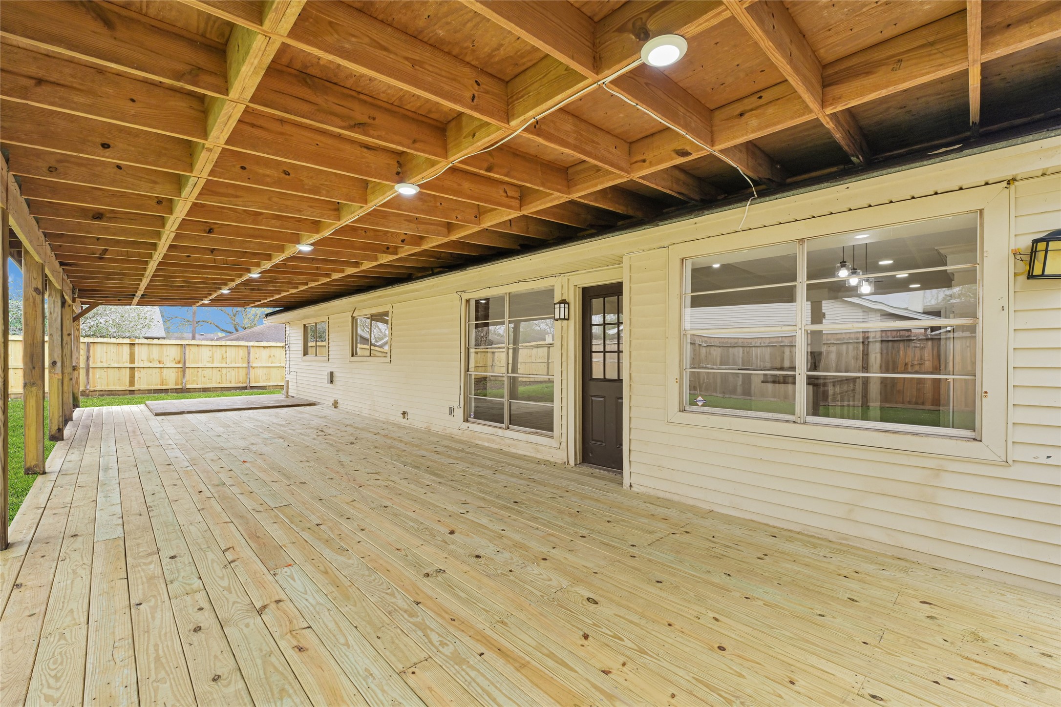 4102 Townes Forest Road Friendswood, TX 77546 - Photo 42 of 50 Large covered patio with ample space, perfect for relaxing or entertaining.