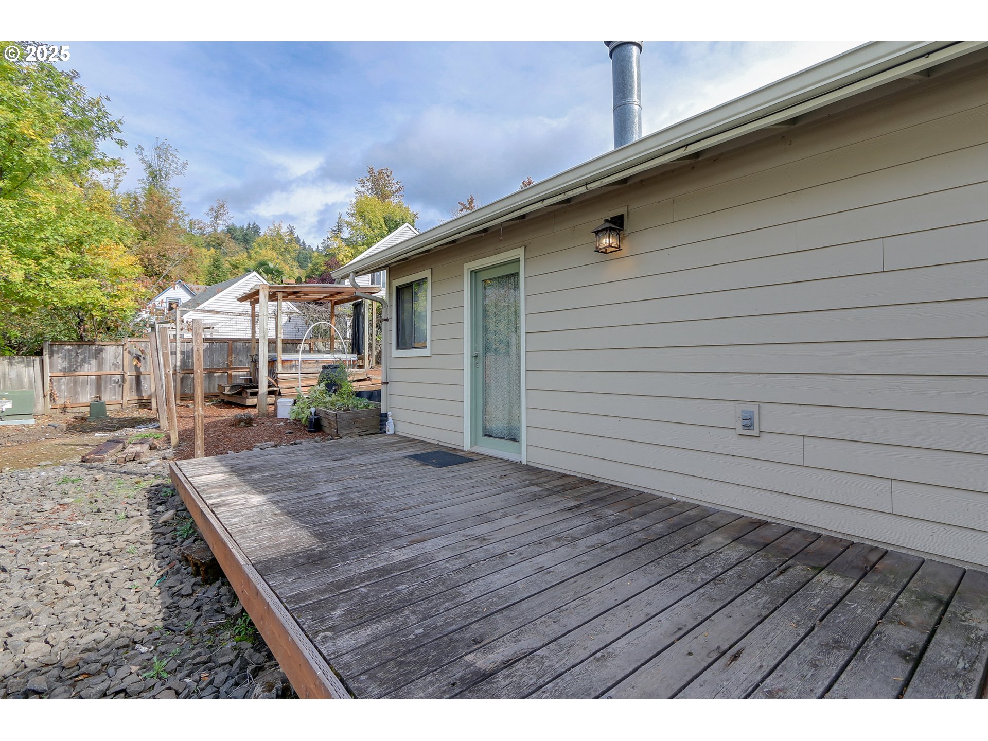 1755 East 43rd Avenue Eugene, OR 97405 - Photo 29 of 34 a view of a backyard with wooden floor