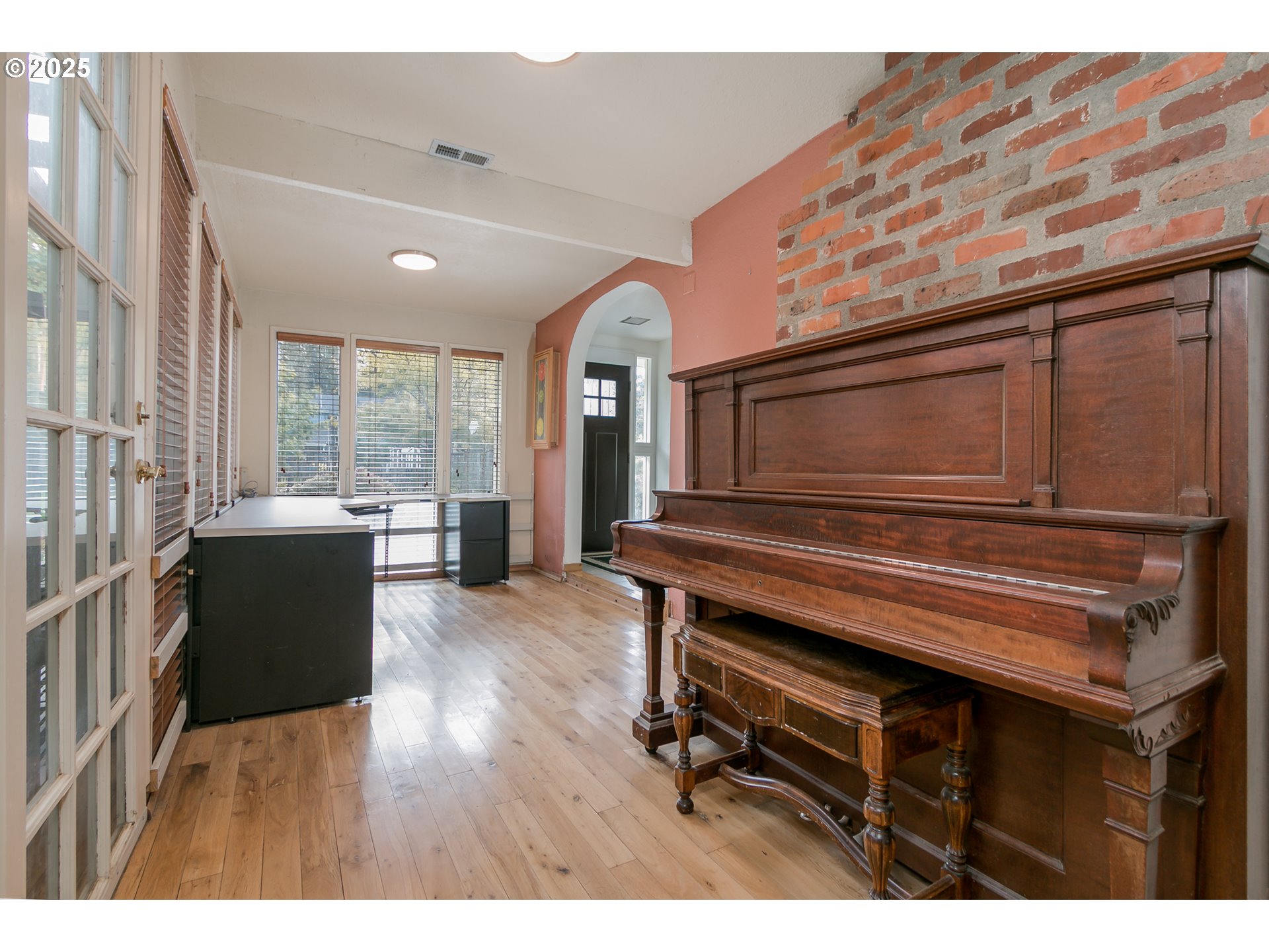 1755 East 43rd Avenue Eugene, OR 97405 - Photo 8 of 34 a living room with furniture a rug and a window