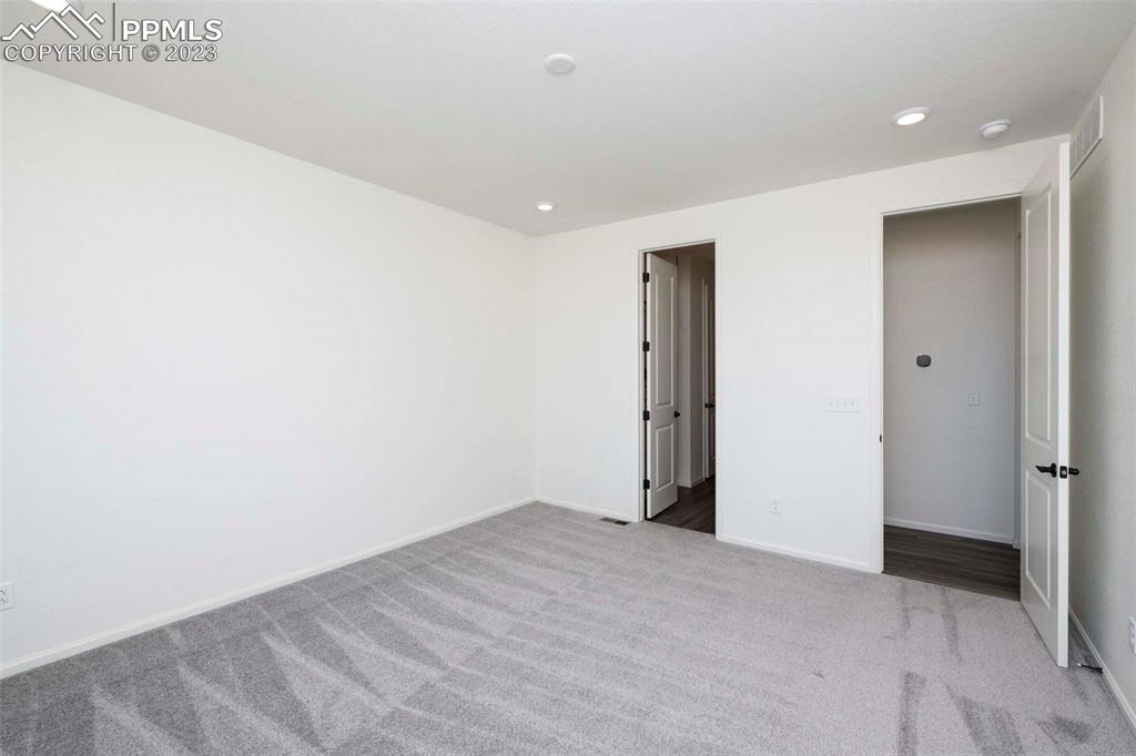 2120 Peachleaf Loop Castle Rock, CO 80108 - Photo 17 of 28 a view of an empty room