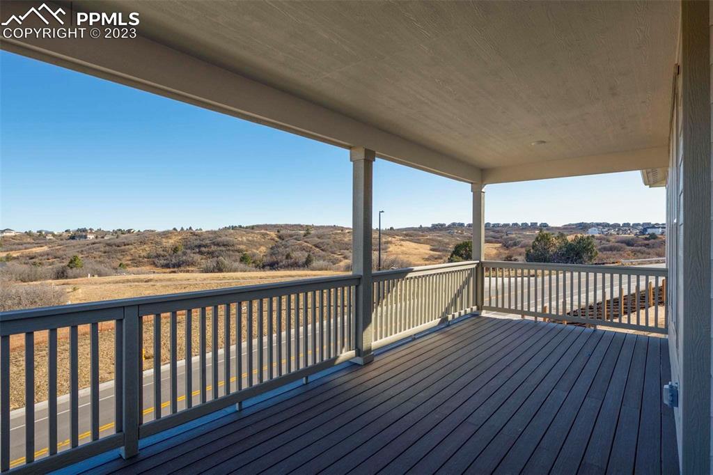2120 Peachleaf Loop Castle Rock, CO 80108 - Photo 28 of 28 a view of a balcony with wooden floor