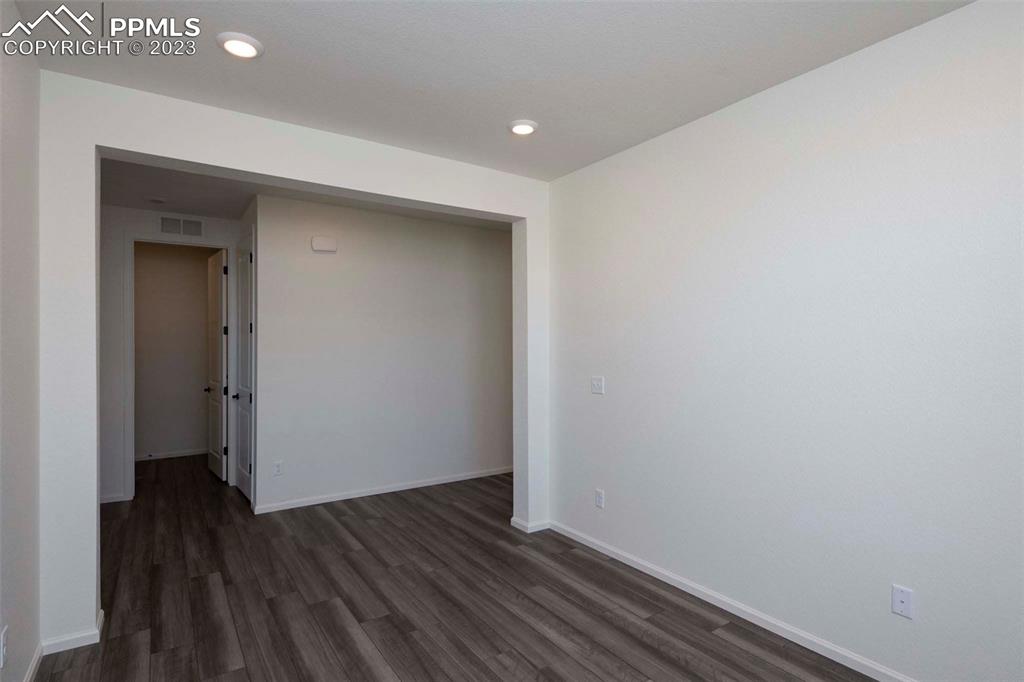 2120 Peachleaf Loop Castle Rock, CO 80108 - Photo 4 of 28 a view of hallway with wooden floor