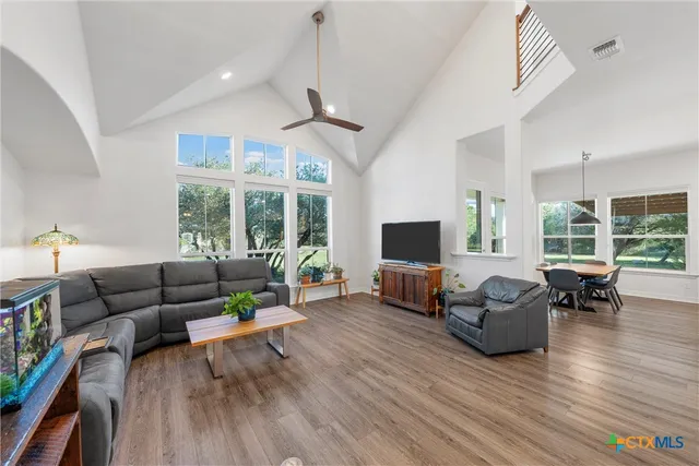a large bathroom with a large tub and sink