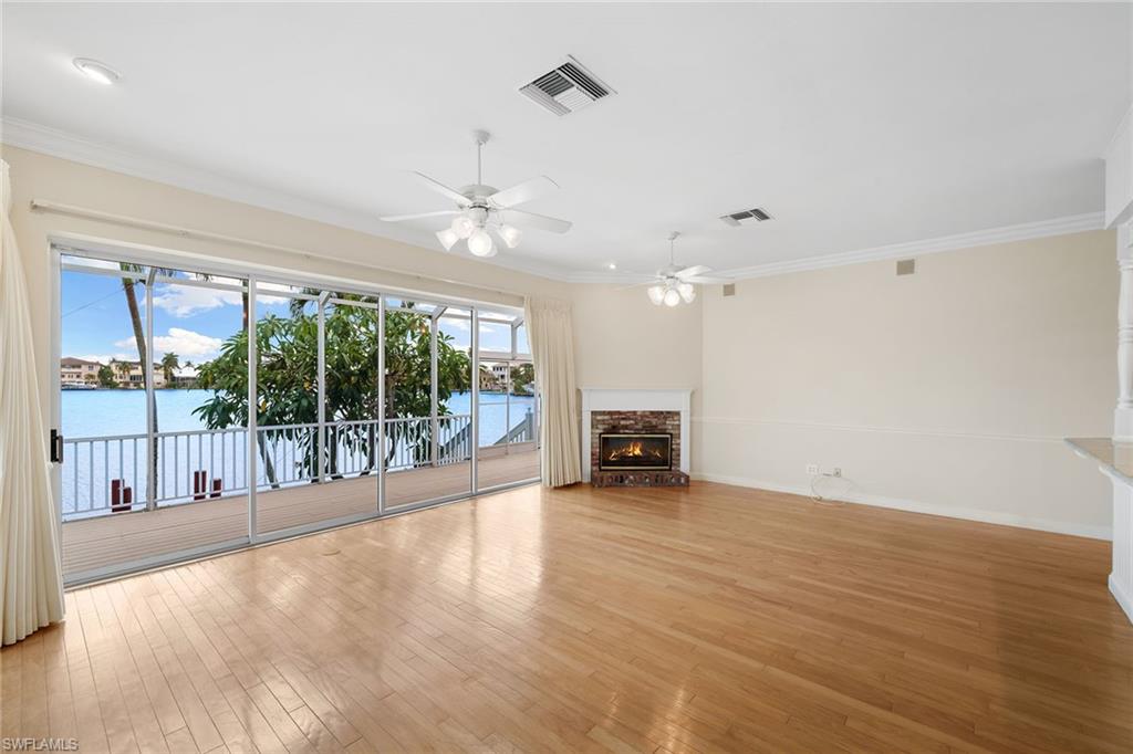 283 Oak Avenue Naples, FL 34108 - Photo 16 of 39 a view of an empty room with a window