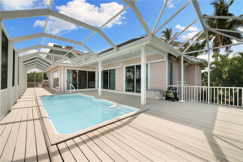 283 Oak Avenue Naples, FL 34108 - Photo 25 of 39 a view of a backyard with a patio