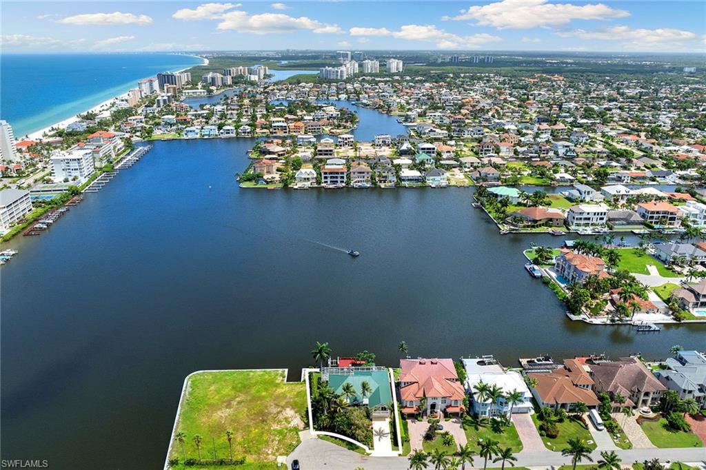 283 Oak Avenue Naples, FL 34108 - Photo 39 of 39 an aerial view of a house with a ocean view