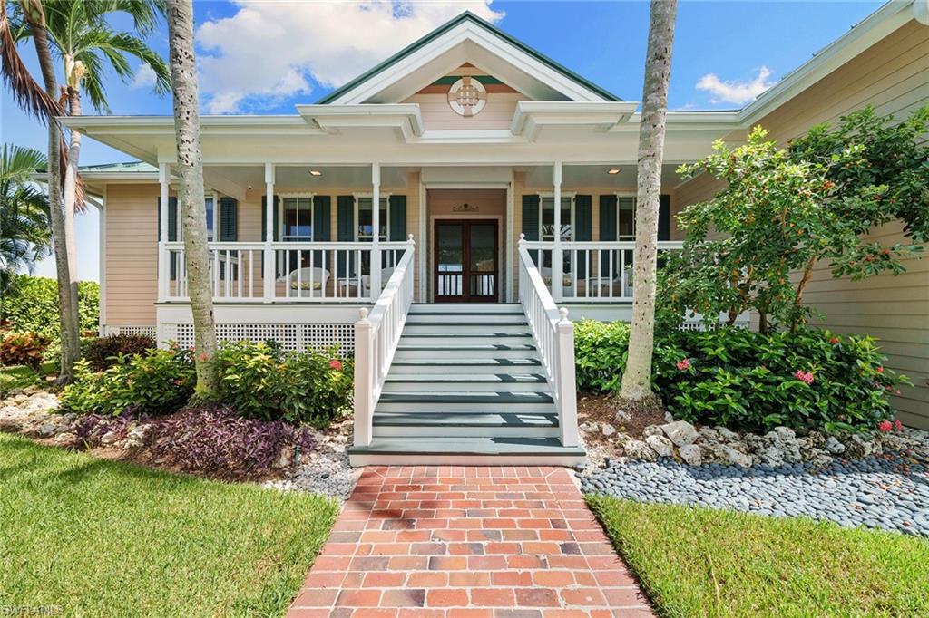 283 Oak Avenue Naples, FL 34108 - Photo 7 of 39 front view of a house