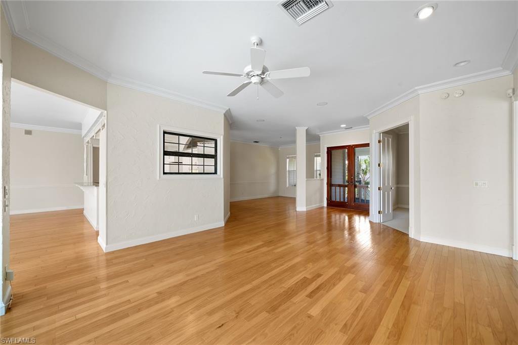 283 Oak Avenue Naples, FL 34108 - Photo 9 of 39 a view of a livingroom with wooden floor