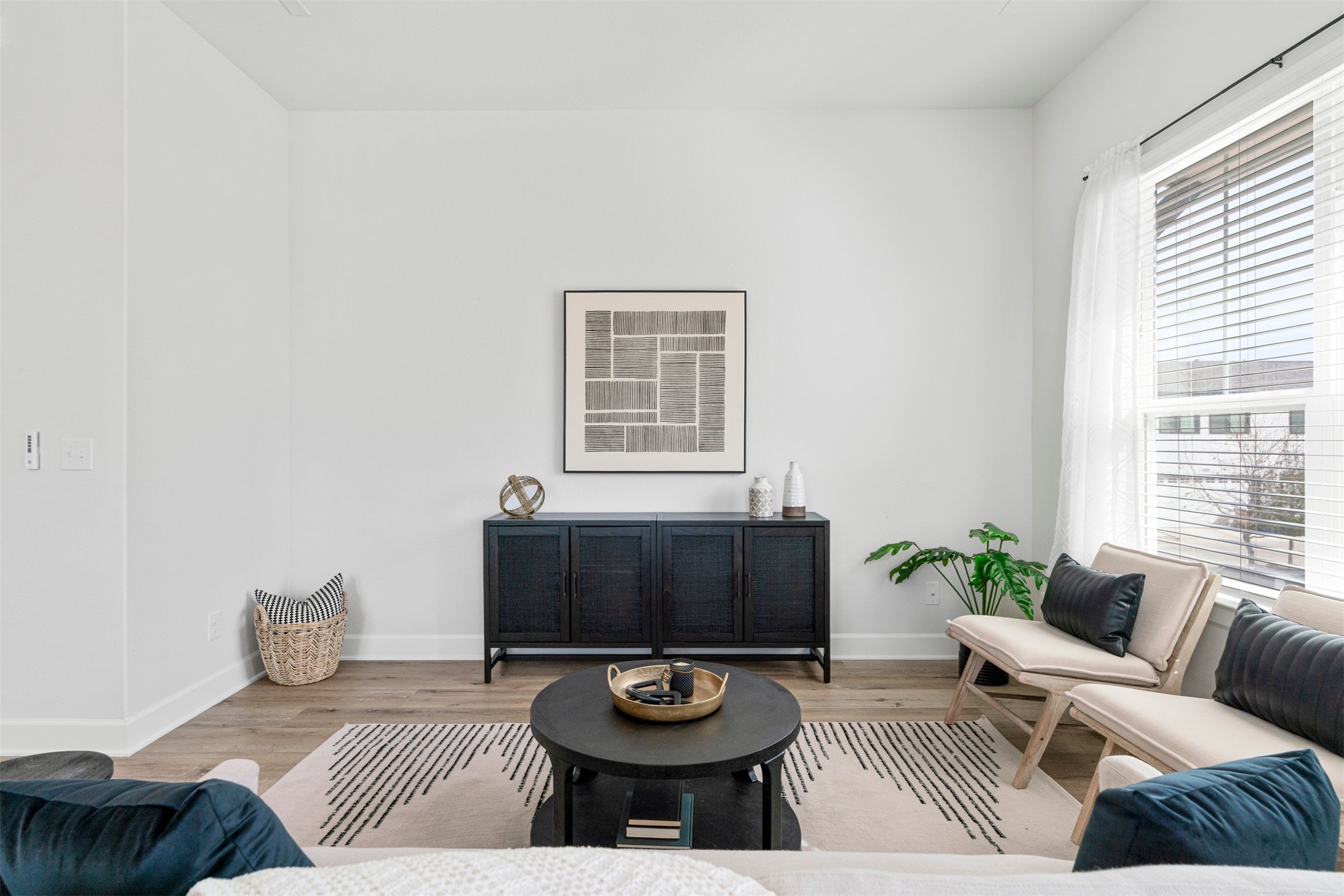3900 Taniguchi Street Austin, TX 78723 - Photo 18 of 39 Neutral-toned walls create the perfect backdrop for whatever mood you want to set, whether that means a gallery of bold artwork, warm wood accents, colorful textiles, or a calm, minimalist look that lets the light and architecture do the talking.