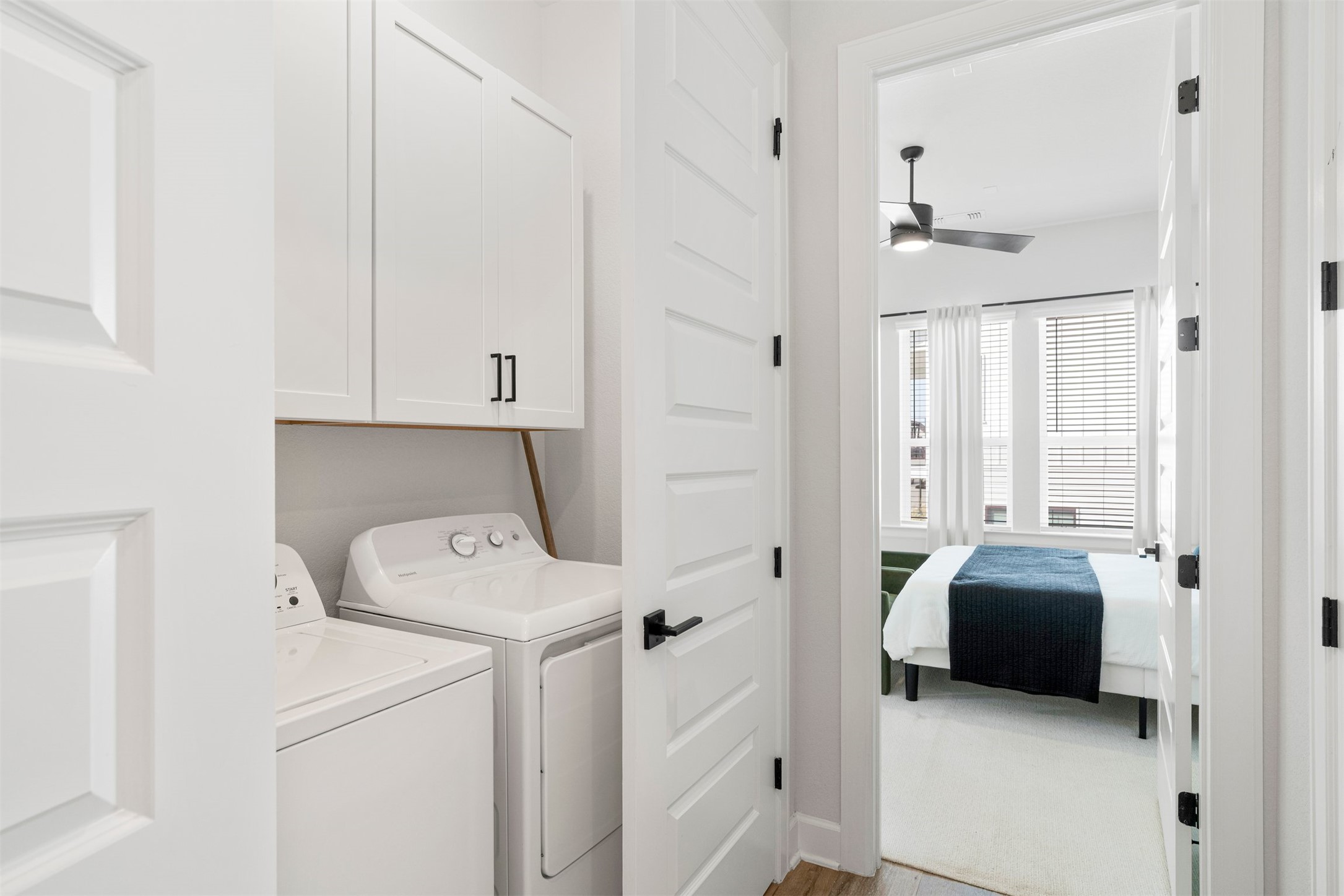 3900 Taniguchi Street Austin, TX 78723 - Photo 30 of 39 The laundry closet sits conveniently outside of the primary suite.