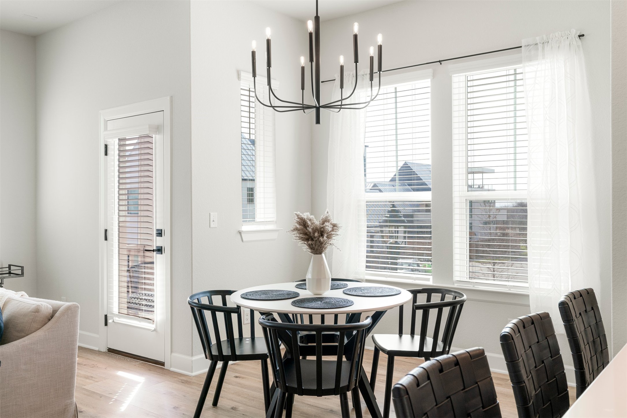 3900 Taniguchi Street Austin, TX 78723 - Photo 3 of 40 a view of a dining room with furniture window and wooden floor