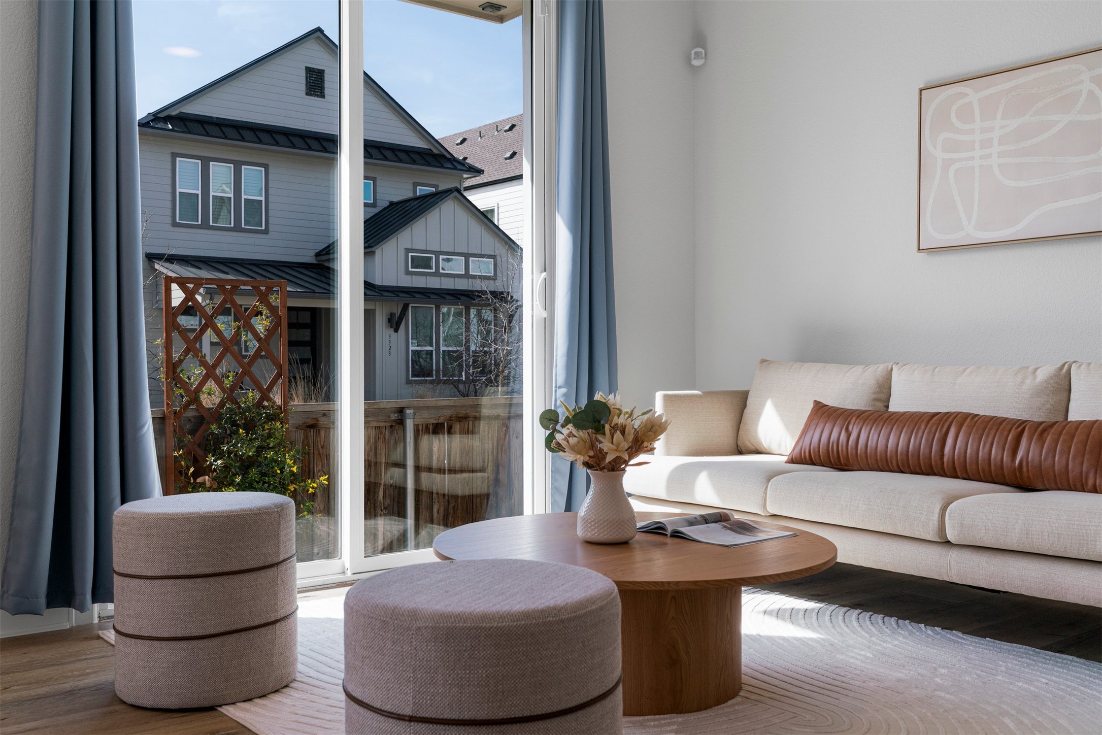 3900 Taniguchi Street Austin, TX 78723 - Photo 10 of 39 This sun filled space has a sliding door that leads out to the side yard.