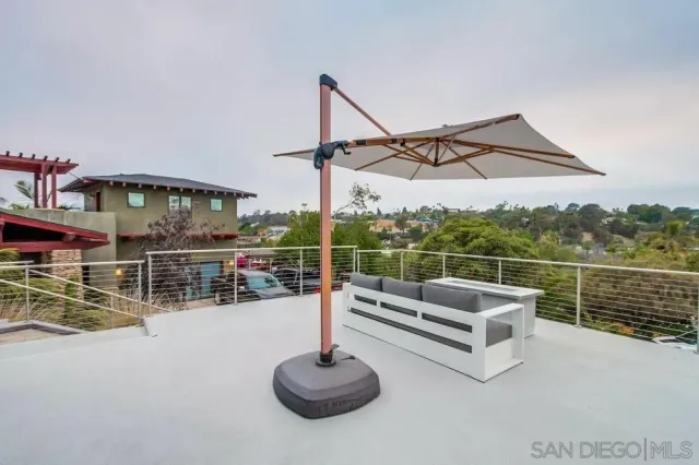 a view of a terrace with chairs