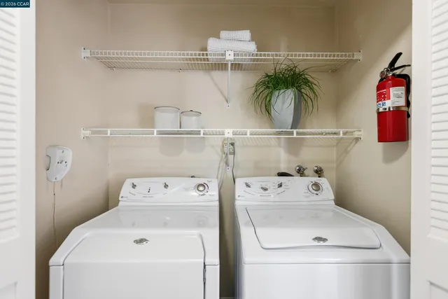 a utility room with a washer and dryer