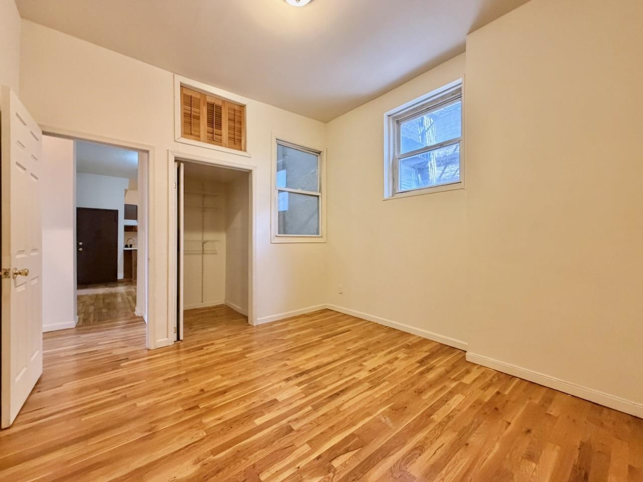 415 1st Street, Unit 2R Hoboken, NJ 07030 - Photo 13 of 22 a view of an empty room with wooden floor
