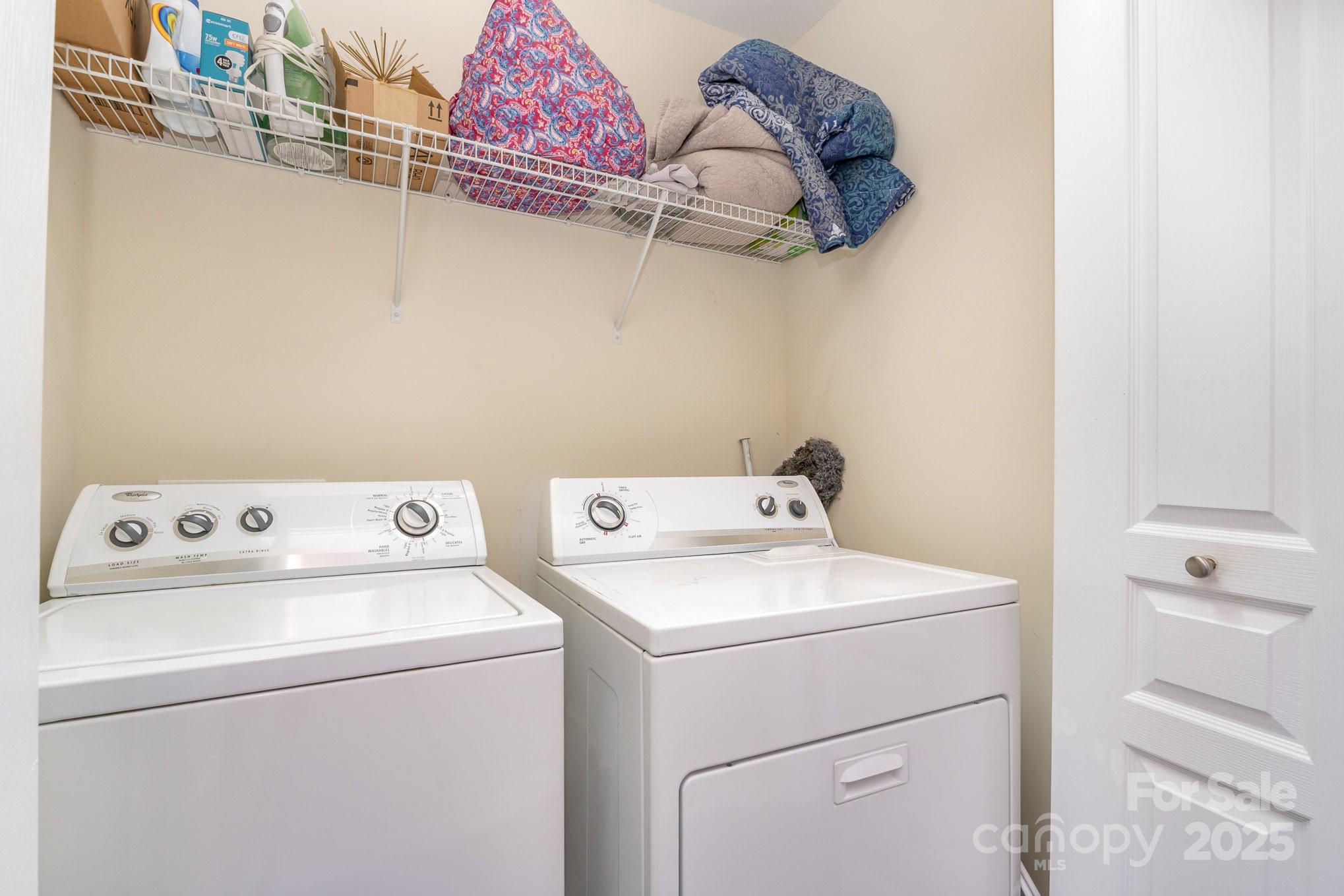 816 Gentlewinds Court Fort Mill, SC 29708 - Photo 13 of 19 a utility room with dryer and washer