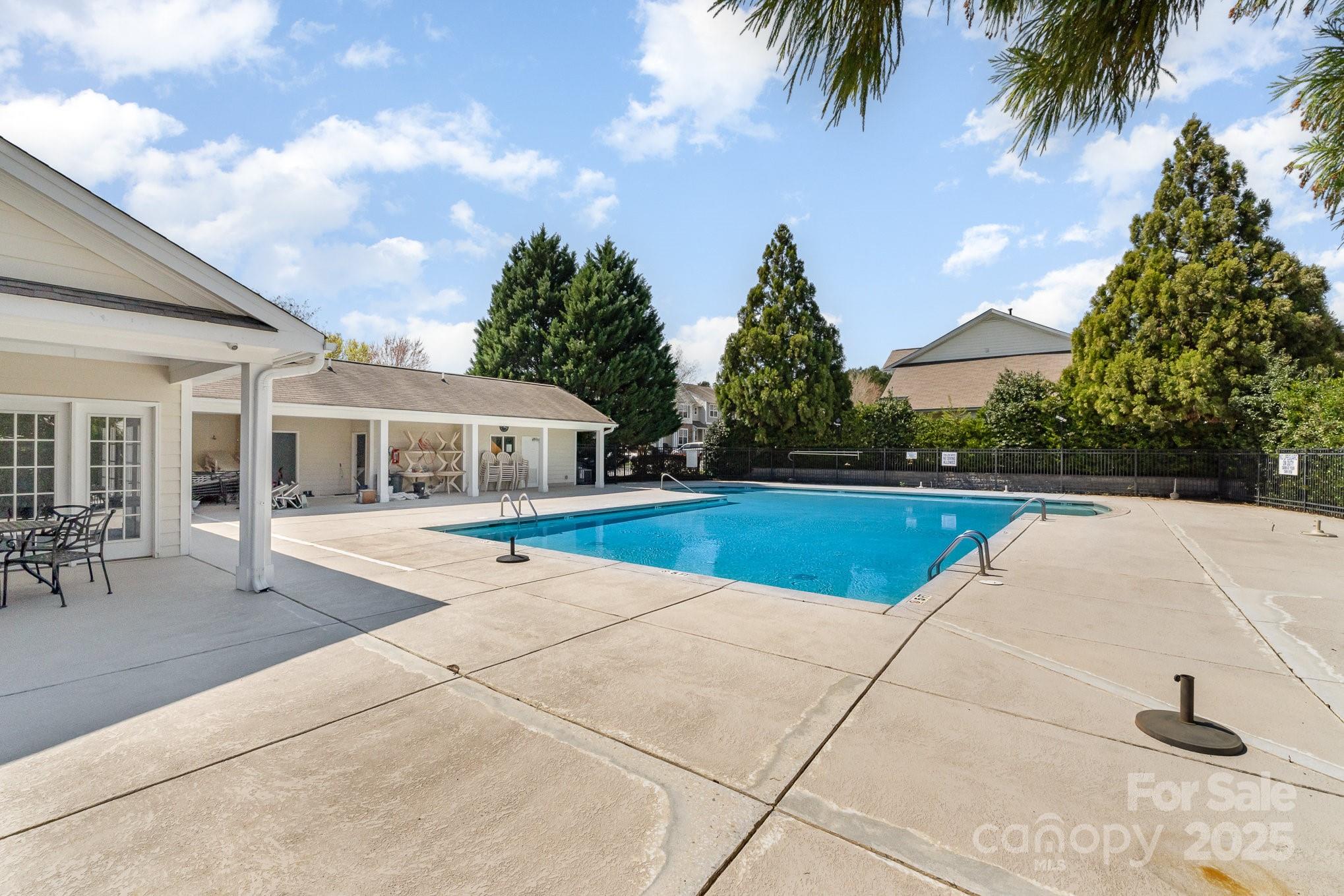 816 Gentlewinds Court Fort Mill, SC 29708 - Photo 16 of 19 a view of a house with swimming pool