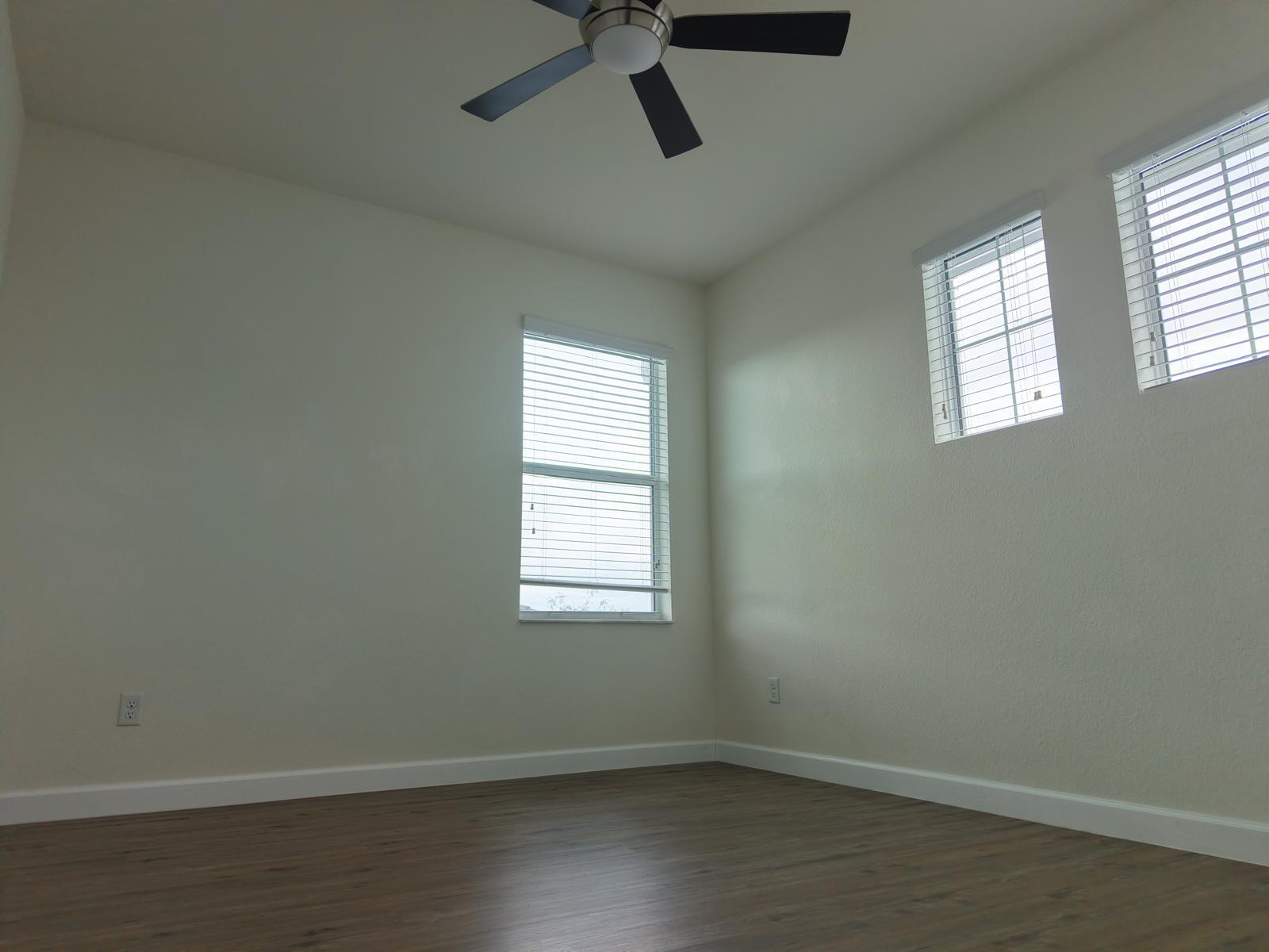 19551 Split Rail Run Loxahatchee, FL 33470 - Photo 33 of 57 corner bedroom wood floors