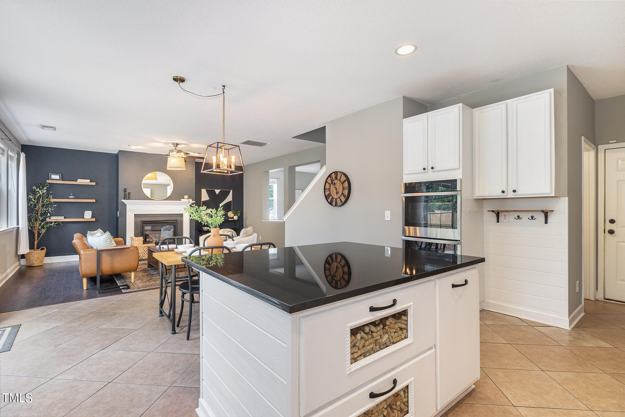 8814 Elizabeth Bennet Place Raleigh, NC 27616 - Photo 13 of 28 a kitchen that has a lot of cabinets in it