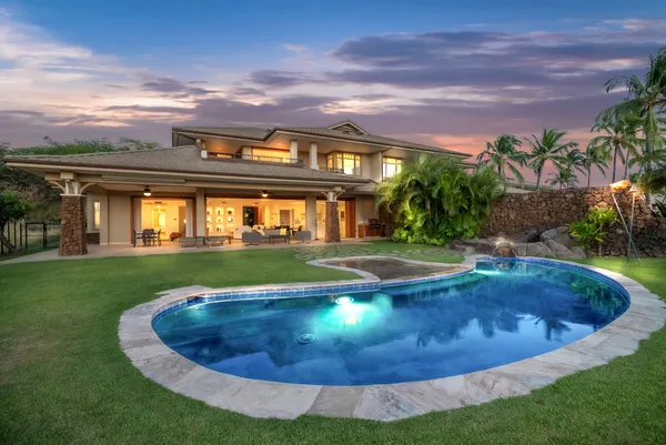a view of a swimming pool with a garden