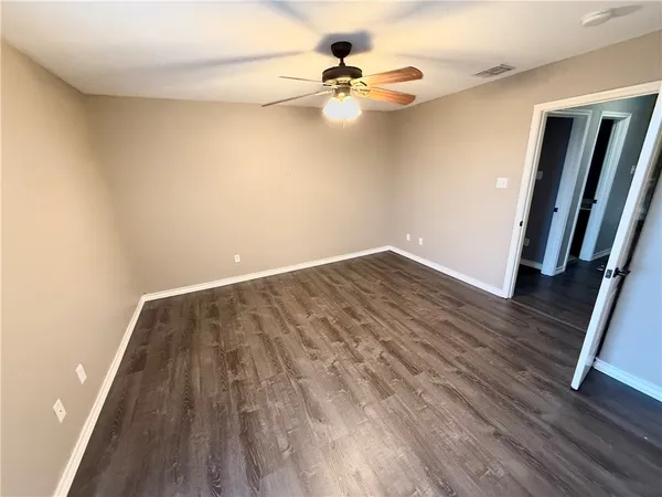 wooden floor in a hall with an entryway