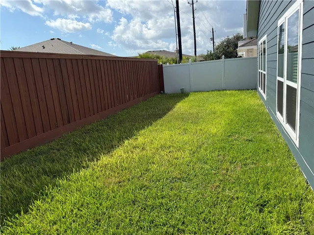 a view of sitting area in front of house
