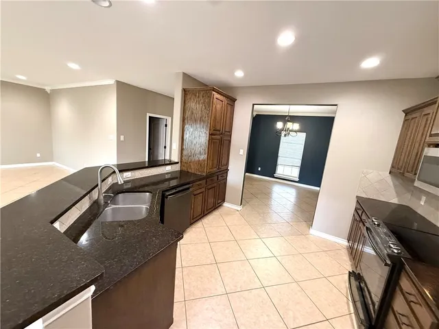 a large bathroom with a double vanity sink and a mirror