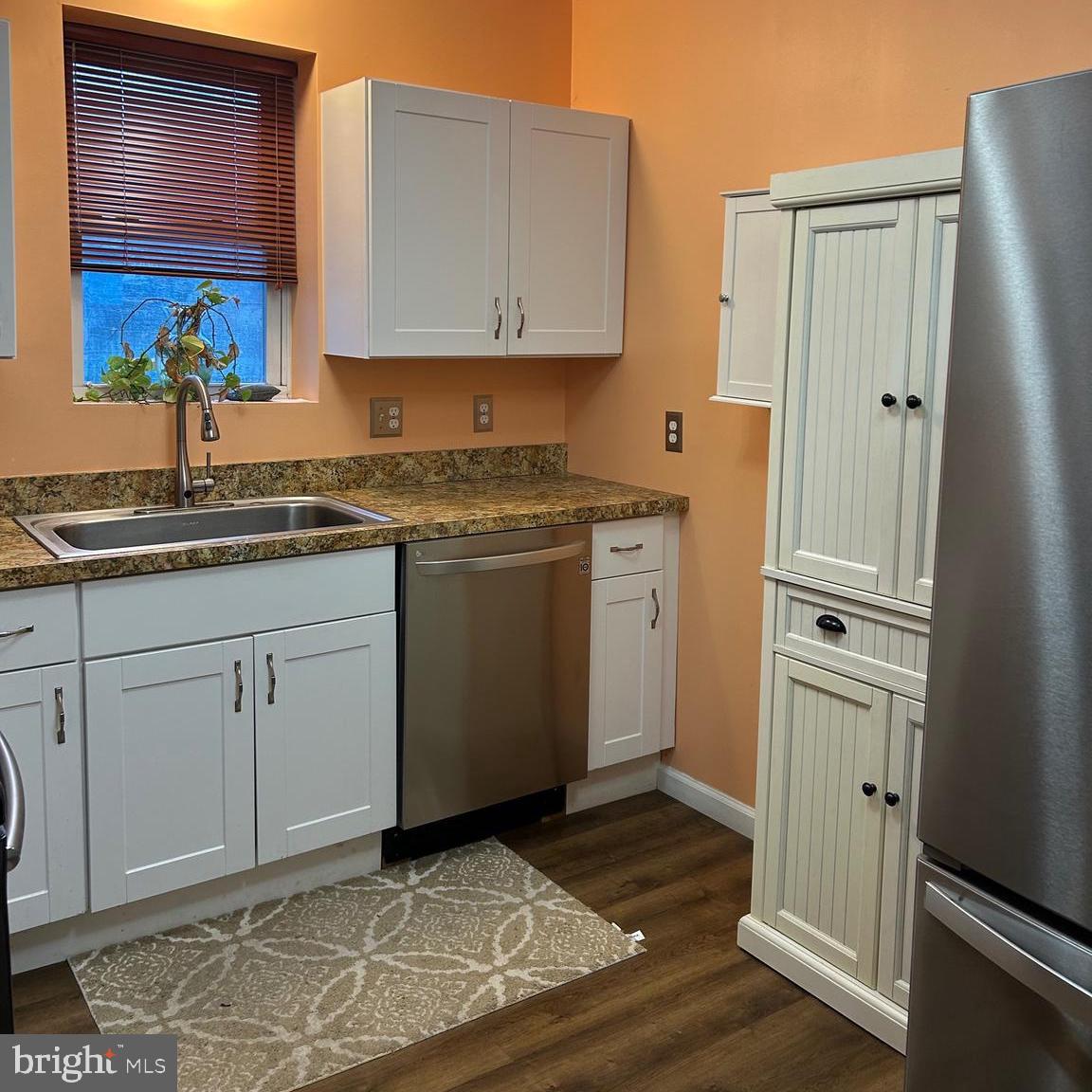 431 Broad Street Spring City, PA 19475 - Photo 14 of 42 a kitchen with stainless steel appliances granite countertop a refrigerator and a stove