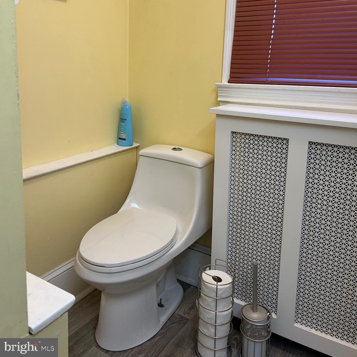 431 Broad Street Spring City, PA 19475 - Photo 25 of 42 a white toilet sitting next to a small bathroom