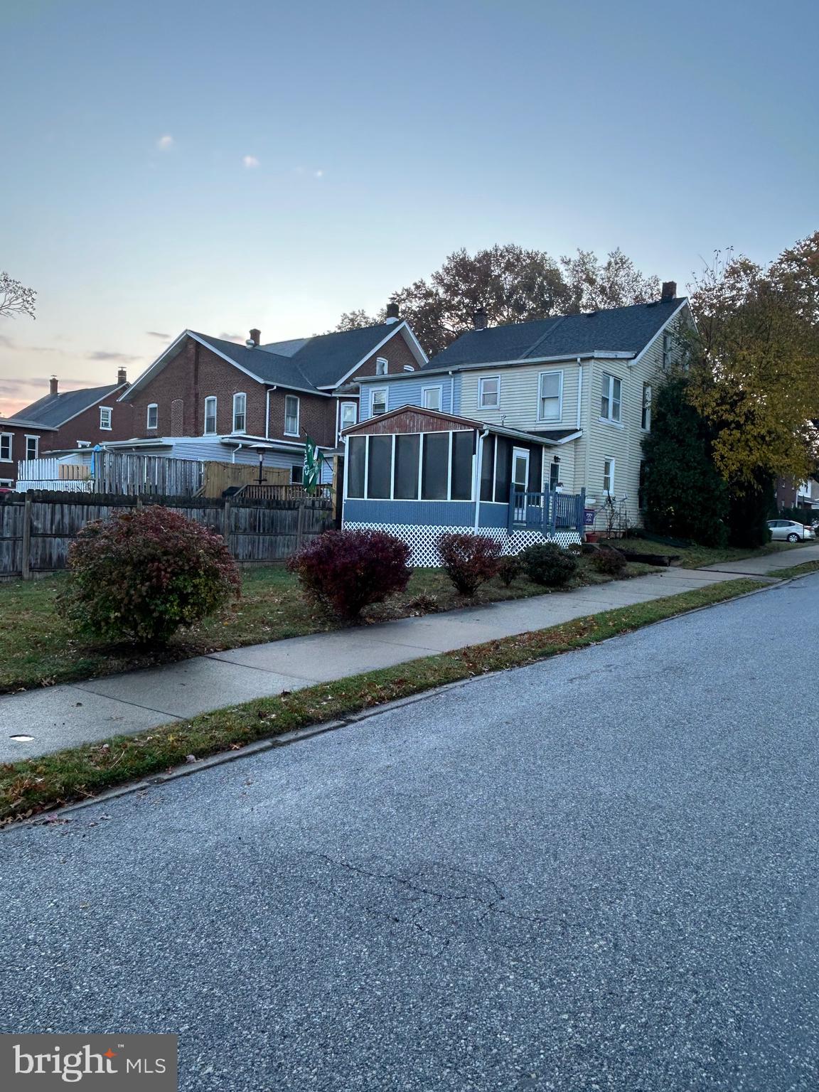 431 Broad Street Spring City, PA 19475 - Photo 39 of 42 a front view of a house with a garden and plants
