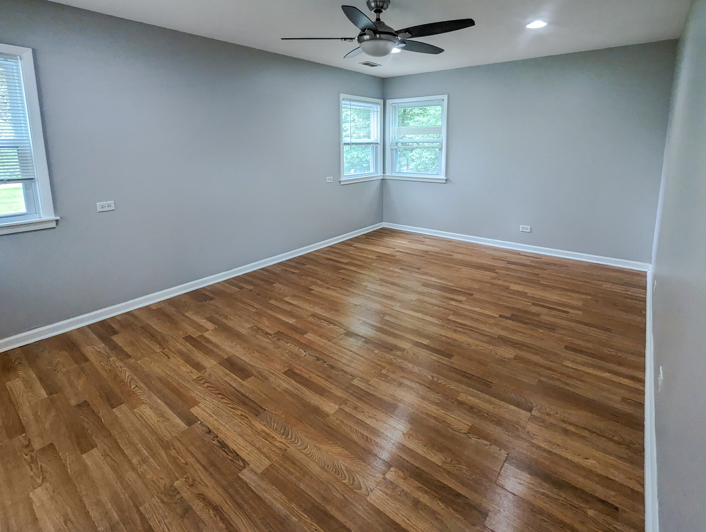 1369 North Quentin Road Palatine, IL 60067 - Photo 4 of 12 an empty room with a window