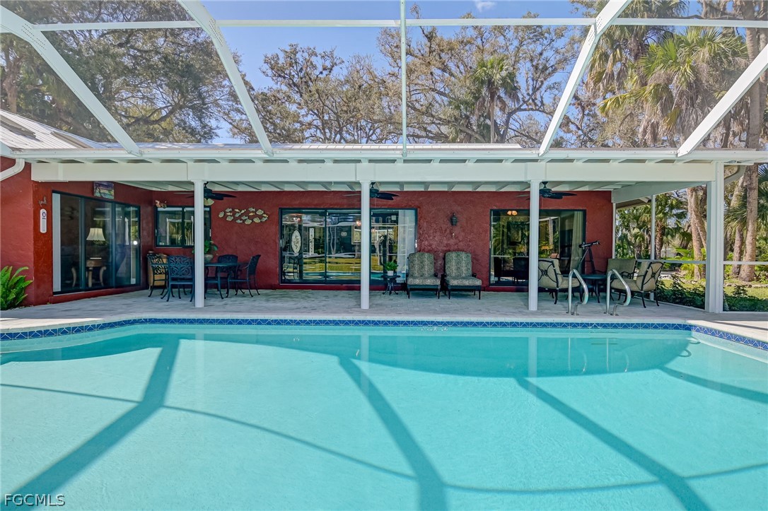 4601 Orange River Loop Road Fort Myers, FL 33905 - Photo 12 of 50 an outdoor space view with a swimming pool