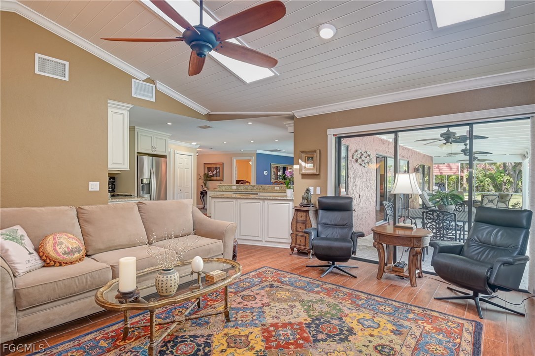 4601 Orange River Loop Road Fort Myers, FL 33905 - Photo 34 of 50 a living room with furniture and a large window