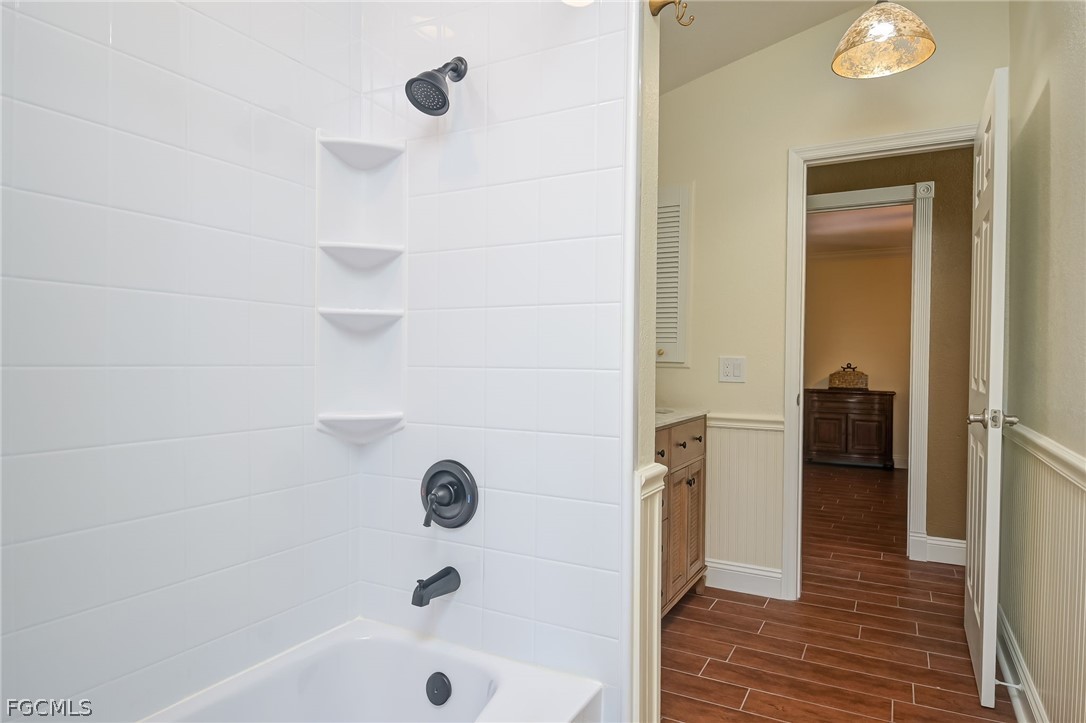 4601 Orange River Loop Road Fort Myers, FL 33905 - Photo 36 of 50 a bathroom with a bathtub and a shower