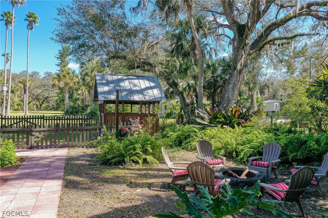 4601 Orange River Loop Road Fort Myers, FL 33905 - Photo 49 of 50 a view of a street with sitting area