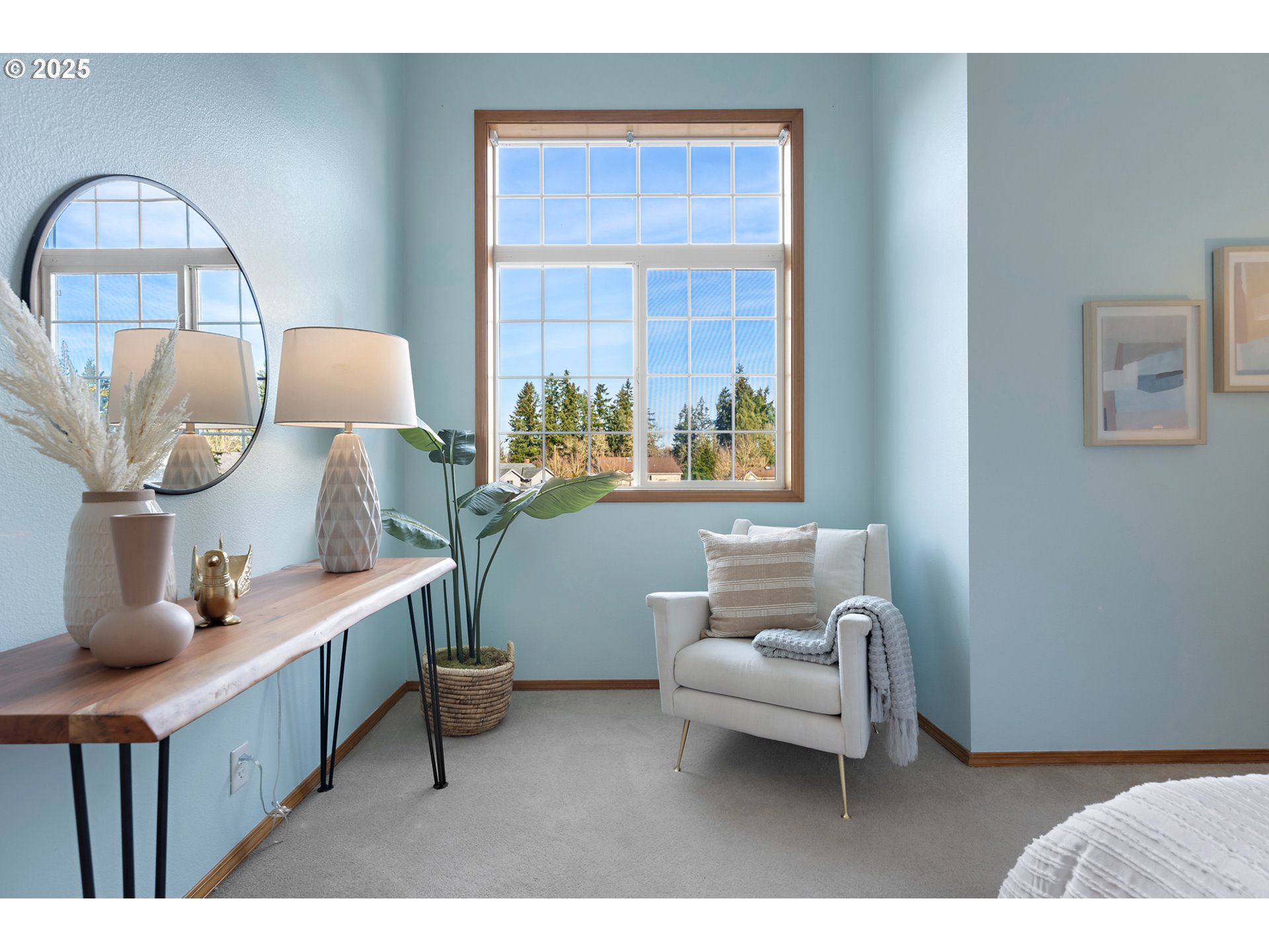 20259 Southwest Celebrity Street Beaverton, OR 97078 - Photo 18 of 40 a living room with furniture a window and a potted plant
