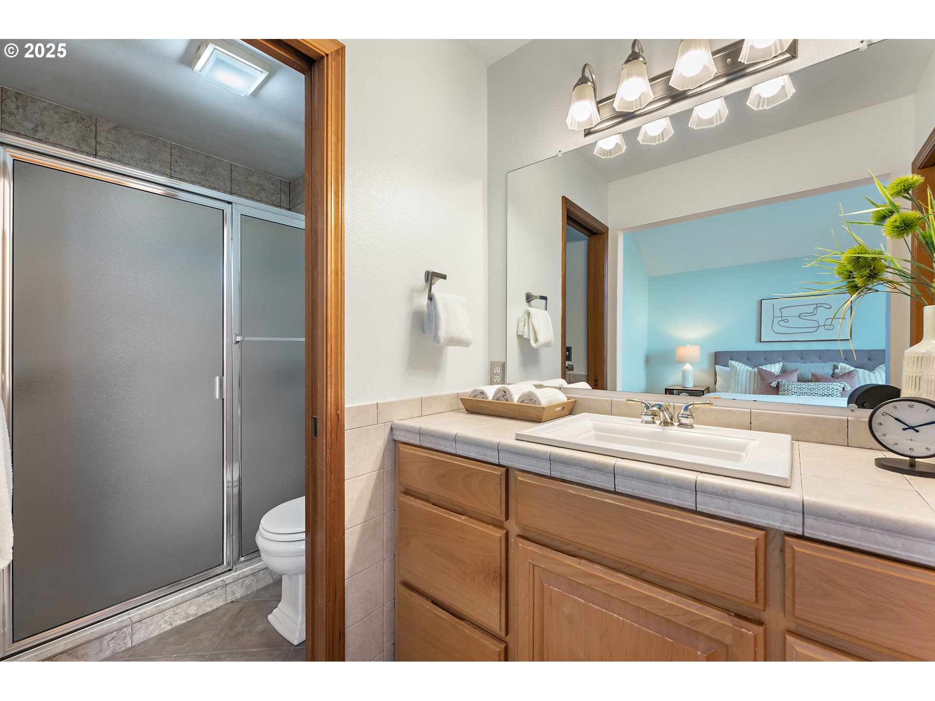 20259 Southwest Celebrity Street Beaverton, OR 97078 - Photo 21 of 40 a bathroom with a sink vanity granite and a mirror