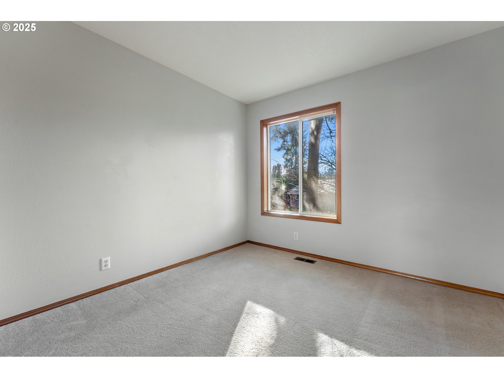 20259 Southwest Celebrity Street Beaverton, OR 97078 - Photo 22 of 40 a view of an empty room with a window