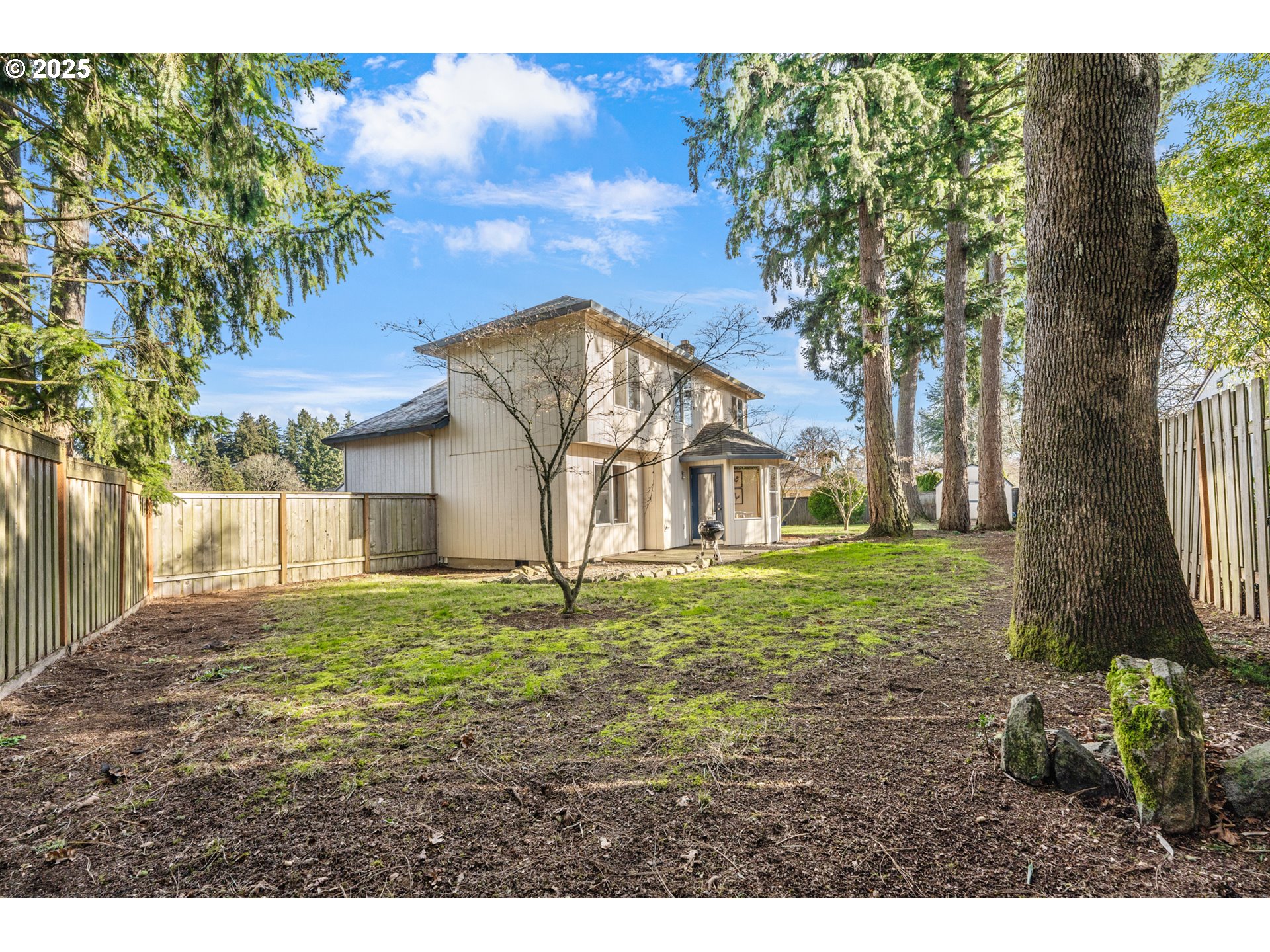 20259 Southwest Celebrity Street Beaverton, OR 97078 - Photo 28 of 40 a front view of a house with a yard