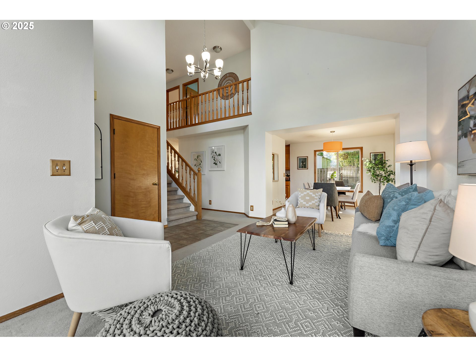 20259 Southwest Celebrity Street Beaverton, OR 97078 - Photo 3 of 40 a living room with furniture and wooden floor