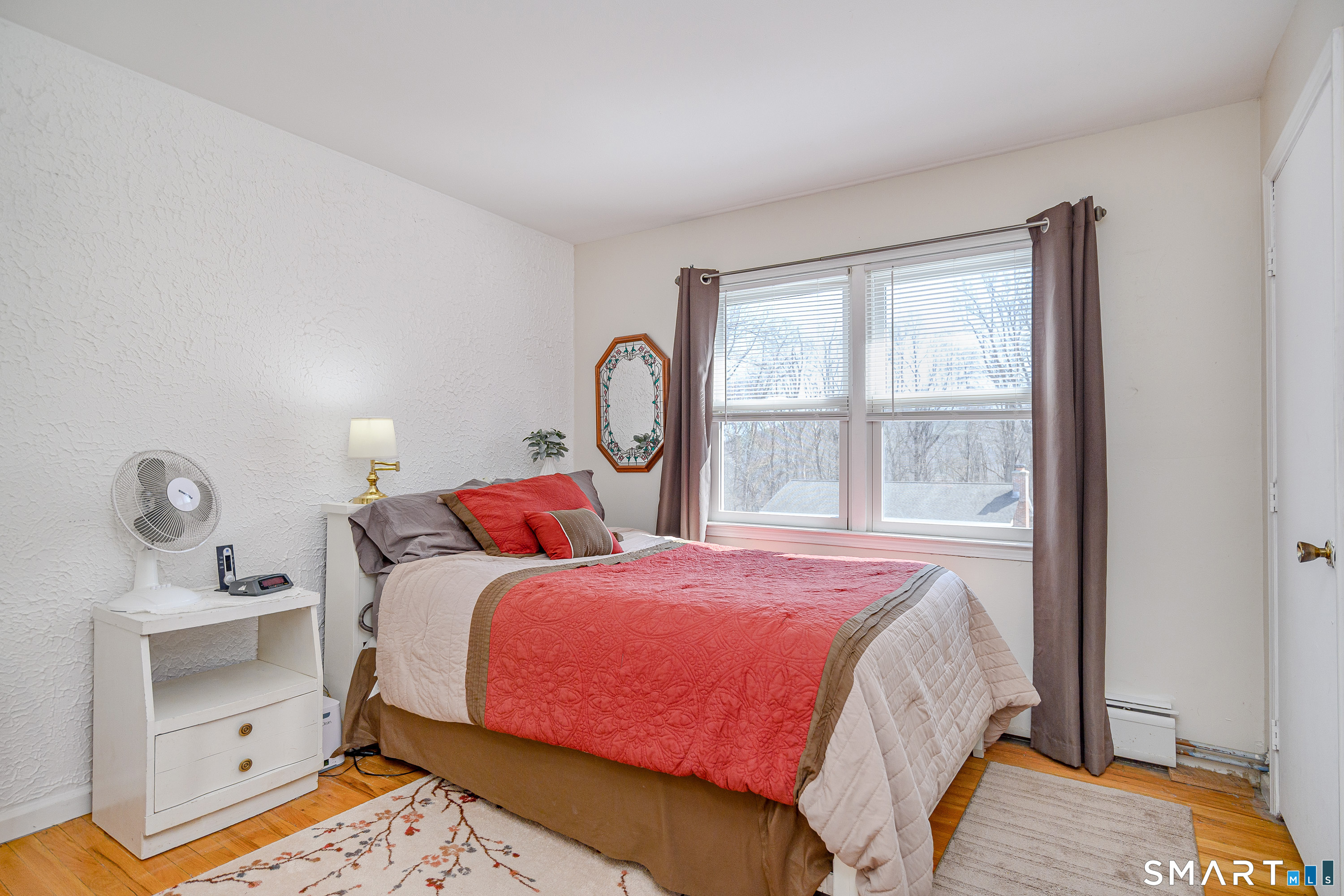 27 Jotham Road New Milford, CT 06776 - Photo 13 of 37 a bedroom with a bed and a window