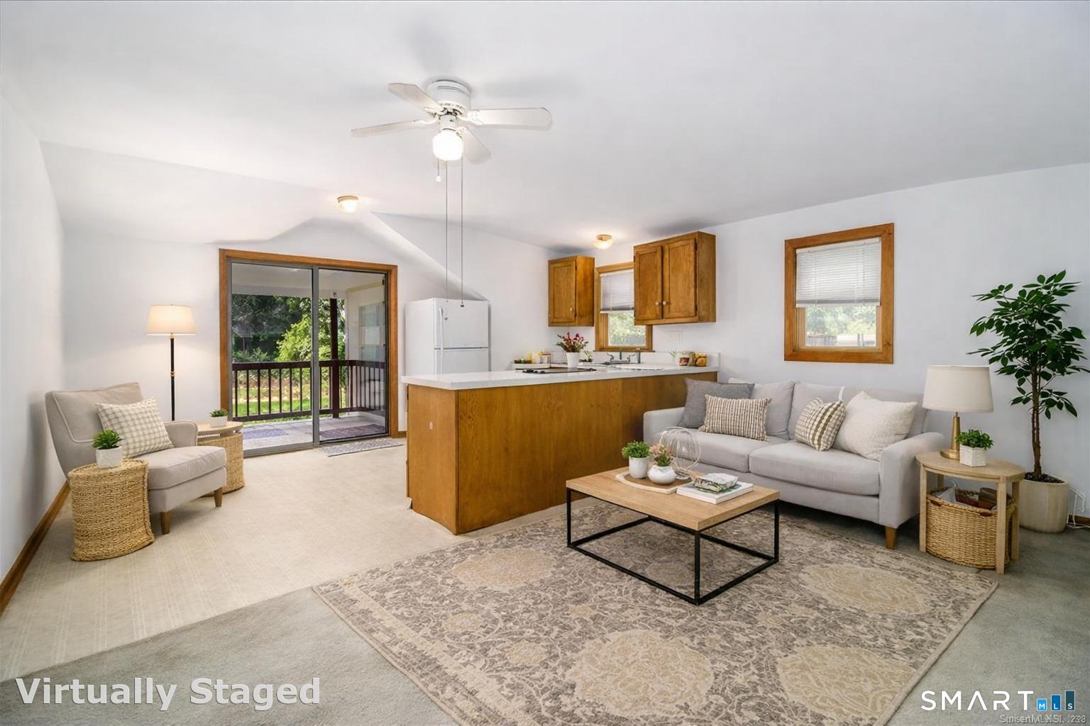 27 Jotham Road New Milford, CT 06776 - Photo 24 of 37 a living room with furniture and a large window