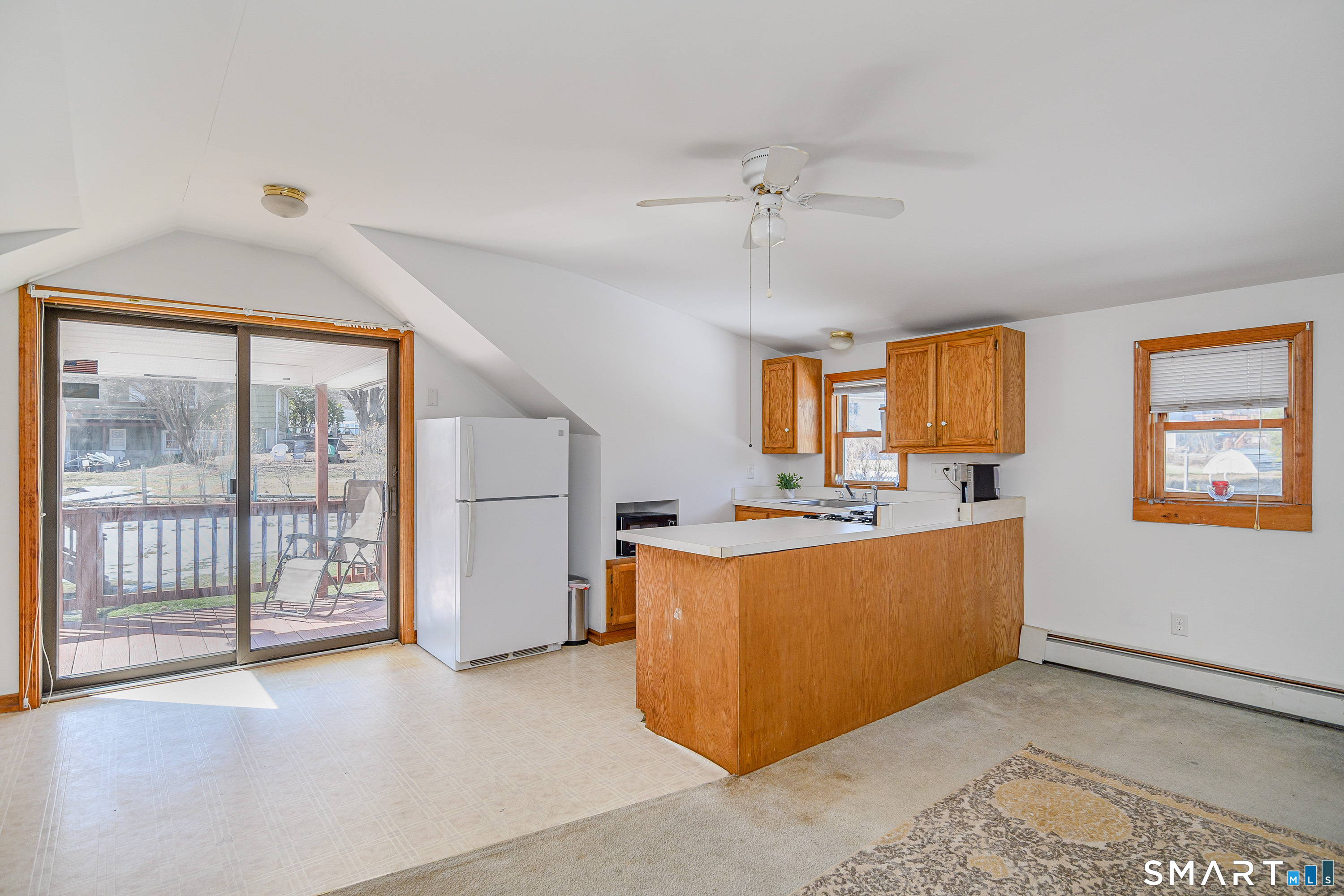 27 Jotham Road New Milford, CT 06776 - Photo 25 of 37 a view of a big room with windows and cabinet