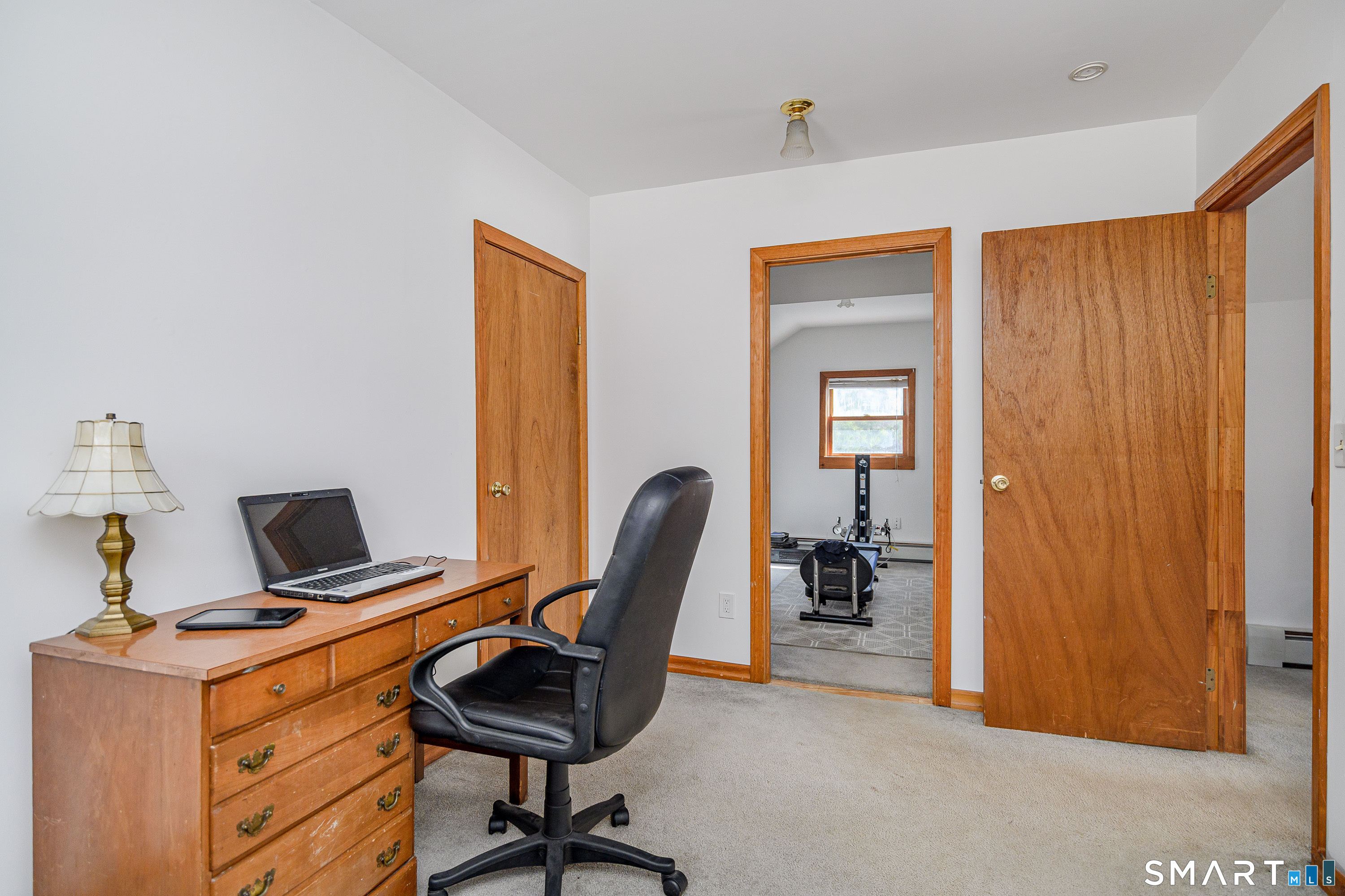 27 Jotham Road New Milford, CT 06776 - Photo 26 of 37 a view of a workspace with furniture and a window