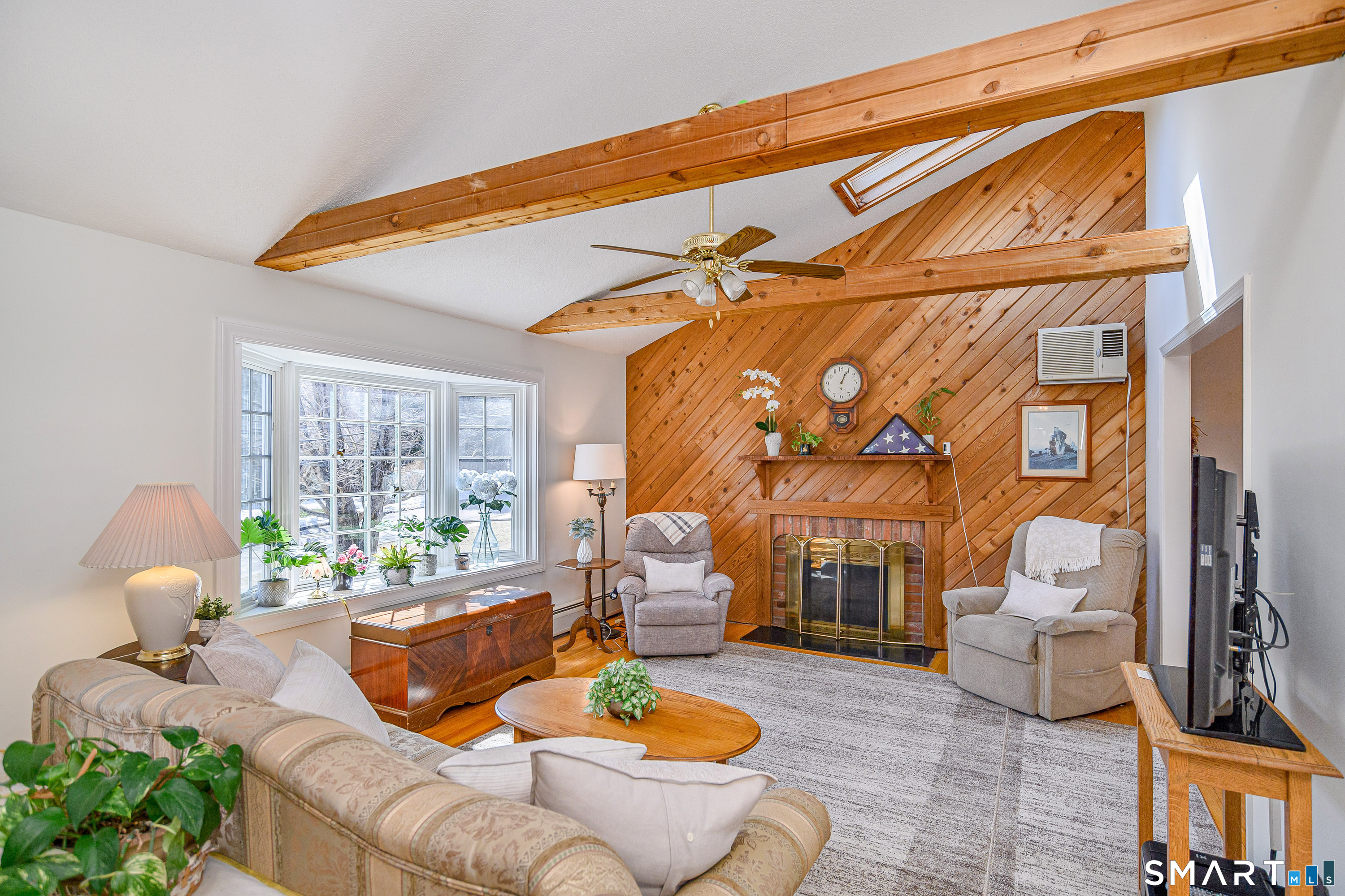 27 Jotham Road New Milford, CT 06776 - Photo 4 of 37 a living room with furniture and garden view