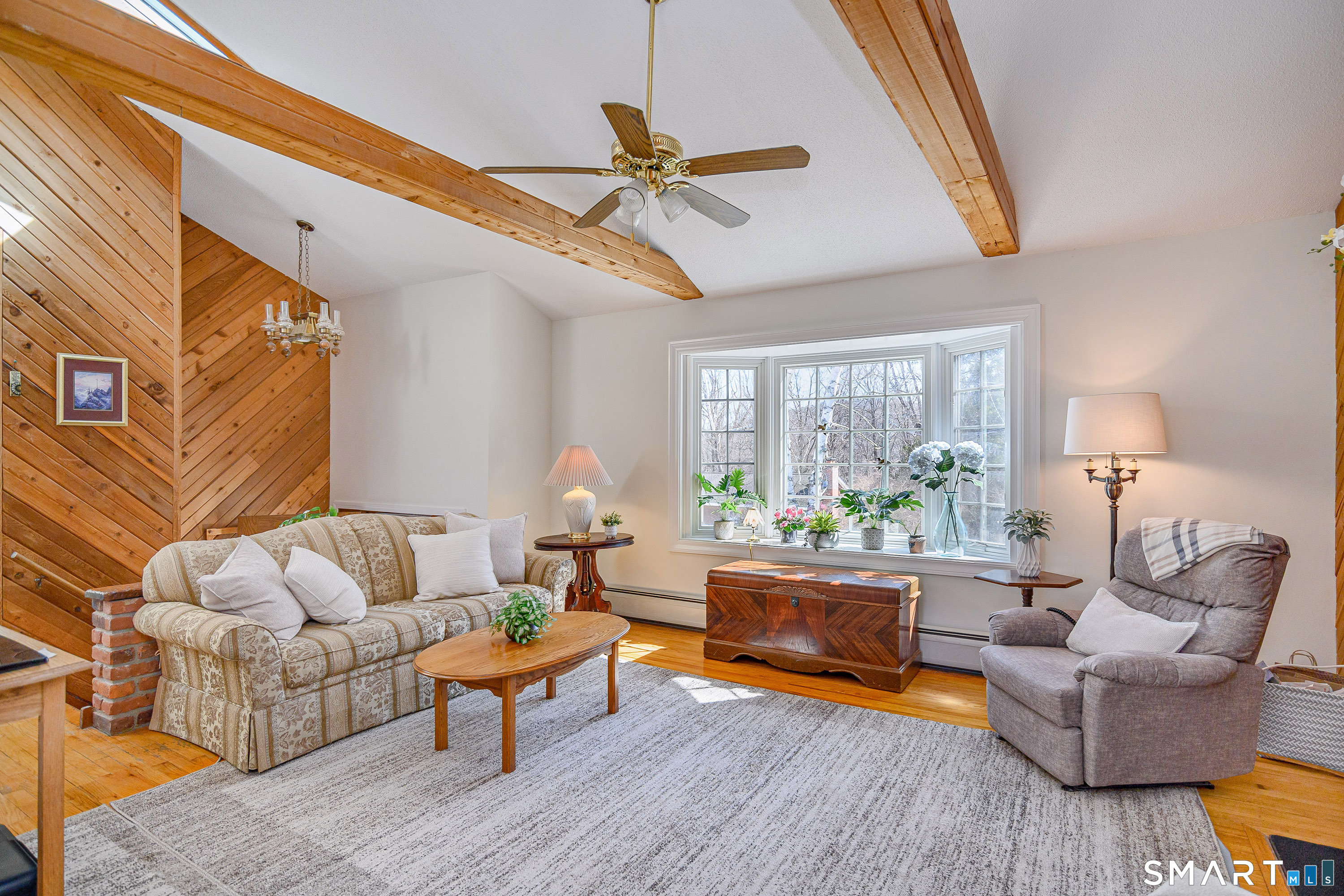 27 Jotham Road New Milford, CT 06776 - Photo 5 of 37 a living room with furniture and a large window
