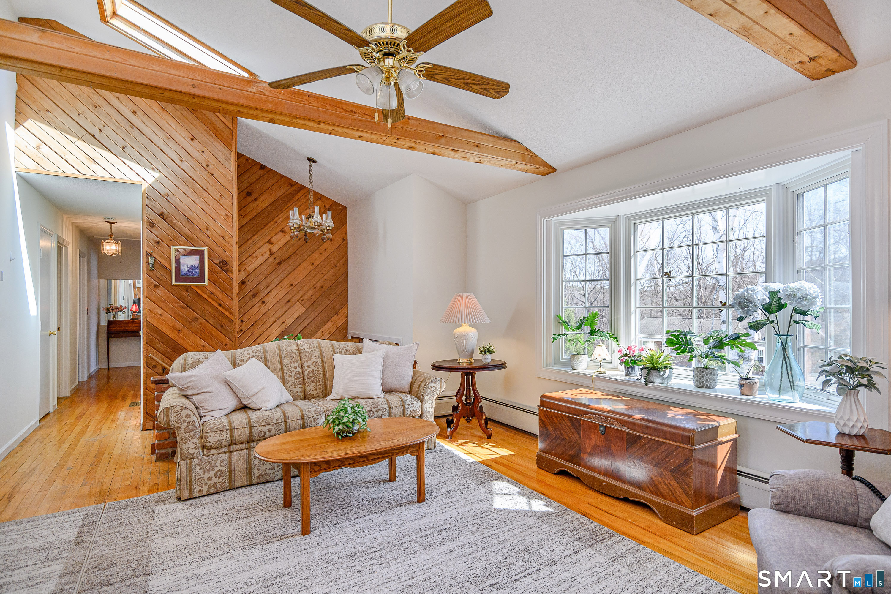 27 Jotham Road New Milford, CT 06776 - Photo 6 of 37 a living room with furniture and a large window