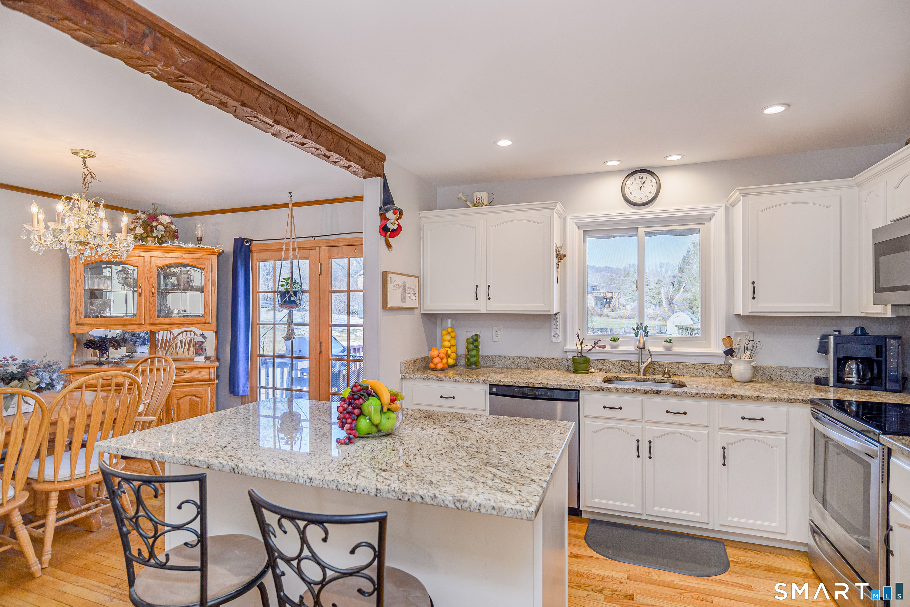 27 Jotham Road New Milford, CT 06776 - Photo 10 of 37 a kitchen with stainless steel appliances kitchen island granite countertop a sink and cabinets