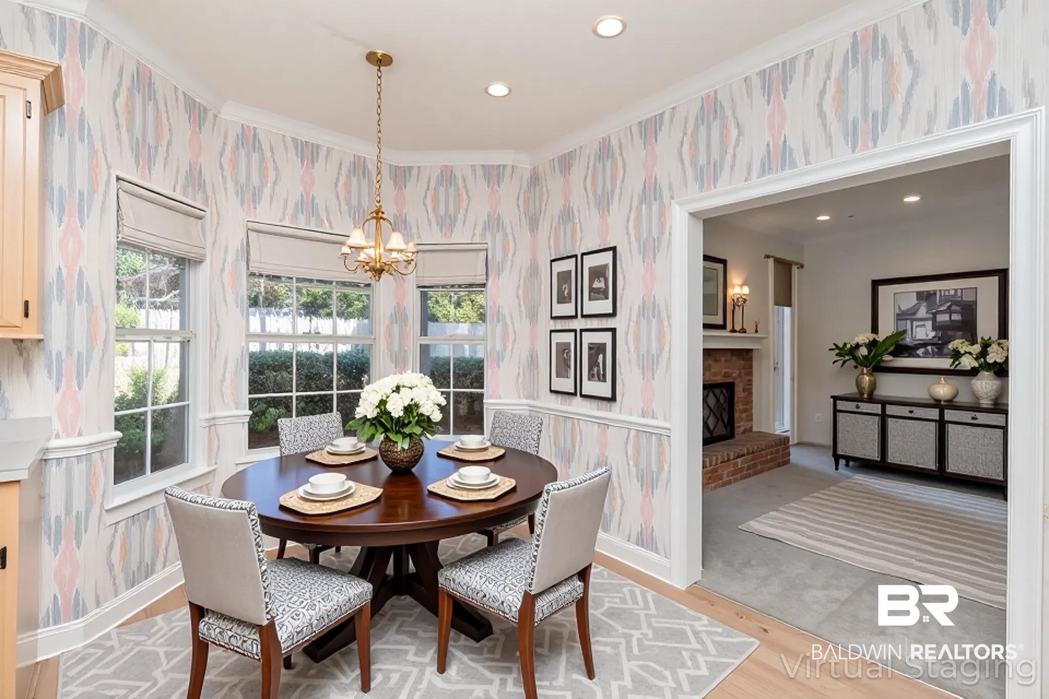 105 McHugh Lane Mobile, AL 36608 - Photo 4 of 30 VIRTUALLY STAGED: Dining space with wallpapered walls, crown molding, light wood-style flooring, recessed lighting, and a fireplace